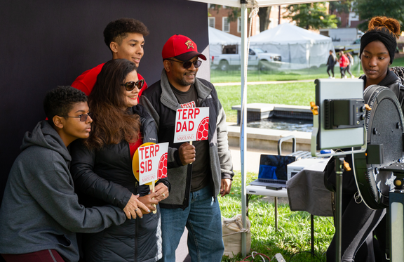 Families taking a photo during Family Weekend